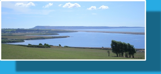 The view across the Fleet Lagoon to the Chesil Beach from Sea Barn Farm